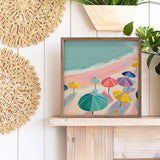Pink Beach With Umbrellas sign