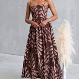 Rosa Clothing - Tropical Leaf Print Spaghetti Strap Flowy Swing Dress