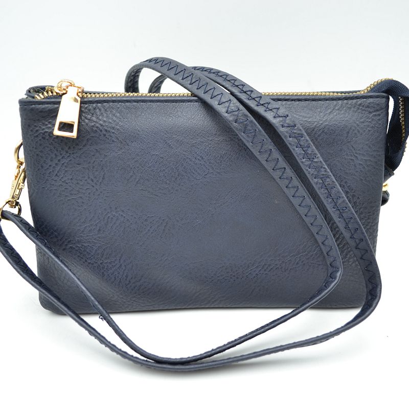 Compartment crossbody/clutch