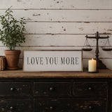 Love You More Capitalized White sign