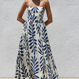 Rosa Clothing - Tropical Leaf Print Spaghetti Strap Flowy Swing Dress
