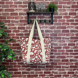 Anju Jewelry - Handcrafted Canvas Bag with Block-Printed Orange Flower Bed