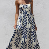 Rosa Clothing - Tropical Leaf Print Spaghetti Strap Flowy Swing Dress