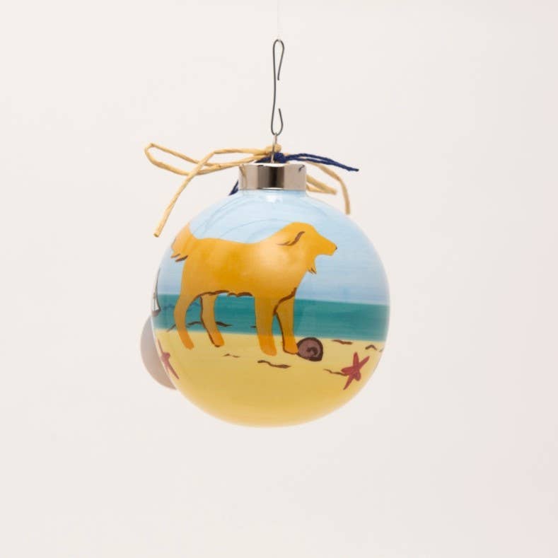 Yellow Dog on Beach Ornament